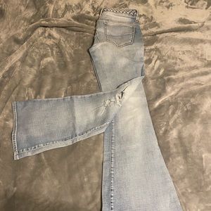 super stretch flared leg jeans with braided waist